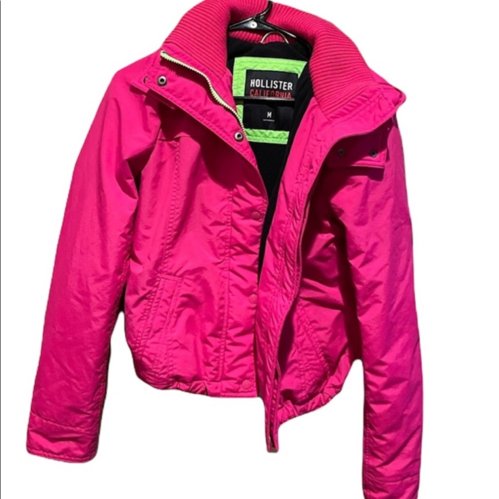 This is a medium pink hollister women’s jacket